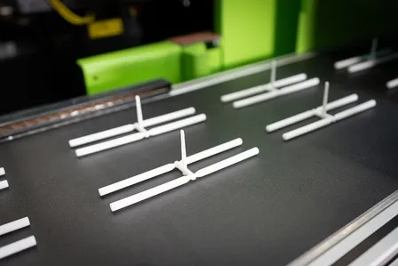 Ceramic injection molded parts on fabrication line